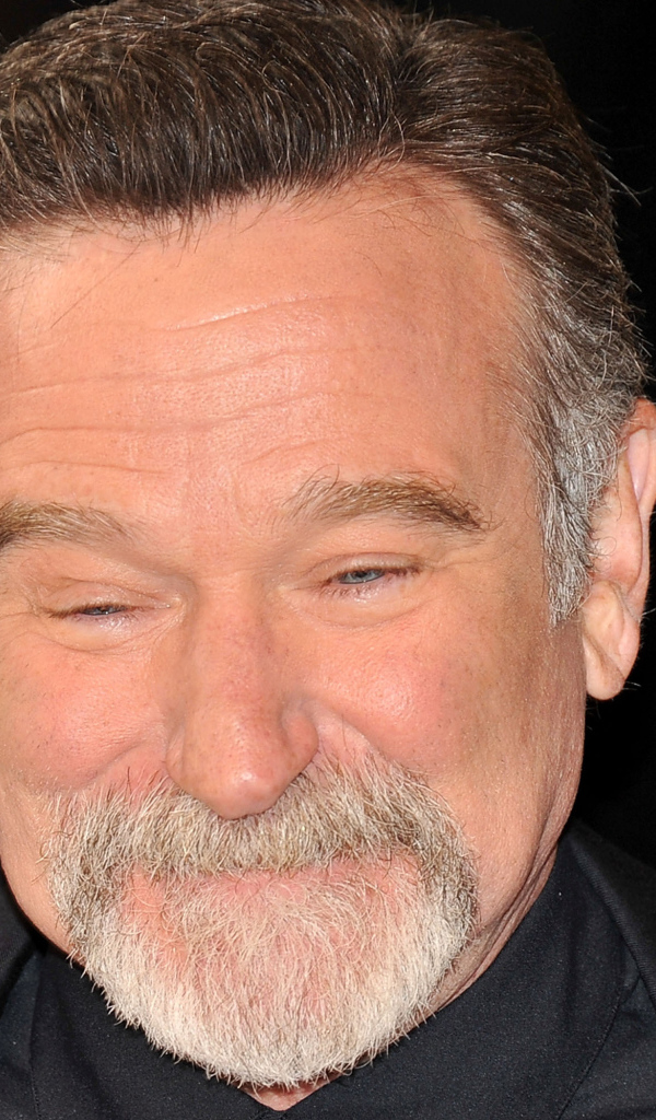 Актер Робин Уильямс улыбается