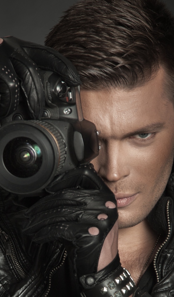 Парень с фотокамерой