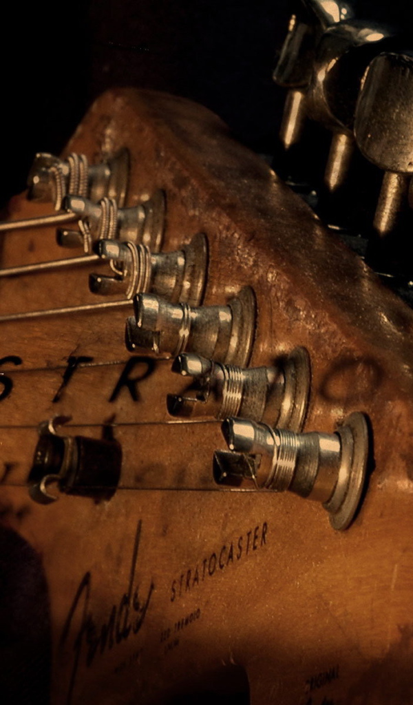 Гриф гитары со струнами