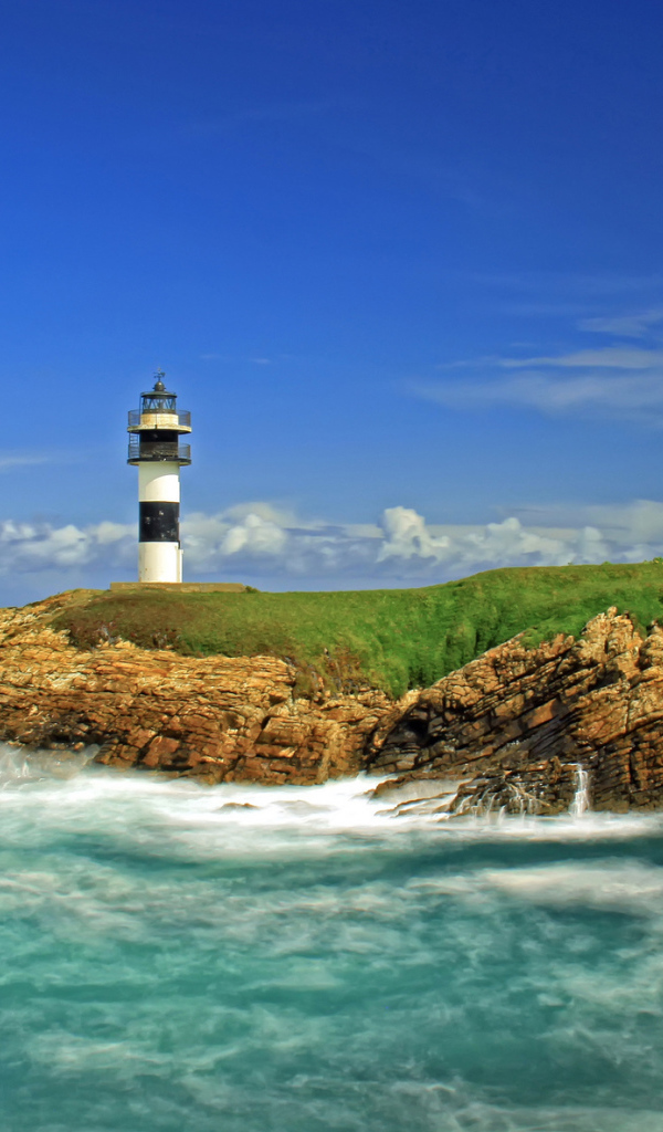 Маяк на острове Рибадео Испания