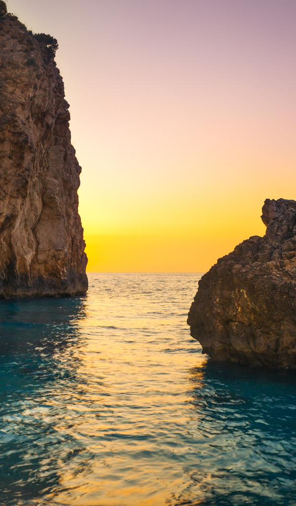 Закат на Милоша Бич на острове Лефкас, Греция