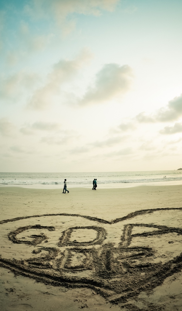 Рисунок на песке в Гоа