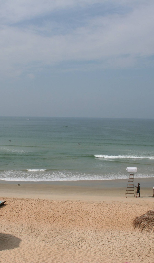 Отдых на пляже в Бенаулиме