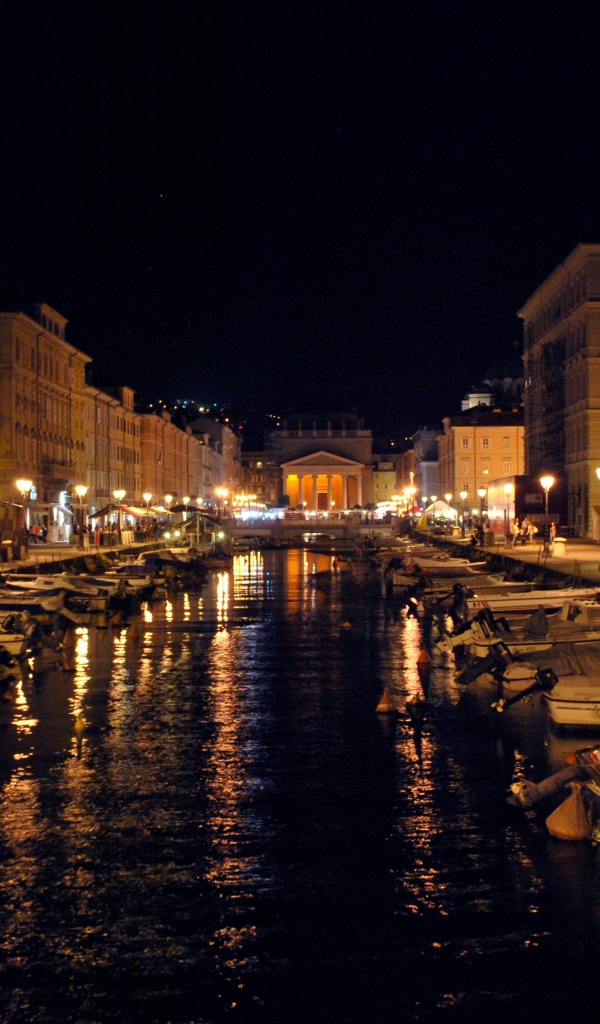 Night lights of the channel at a resort in Trieste, Italy