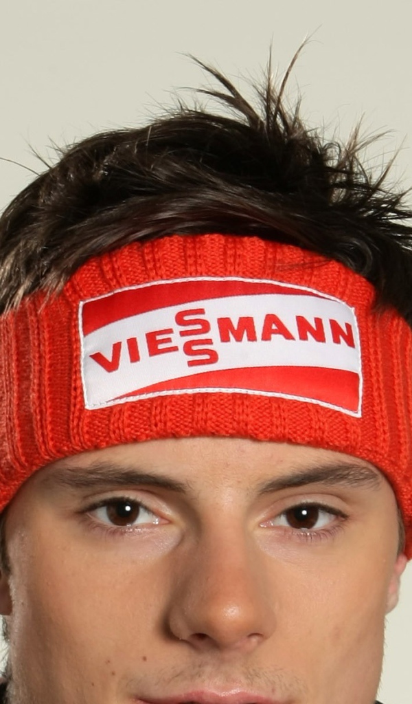 Немецкий прыгун на лыжах Андреас Ванк обладатель золотой медали