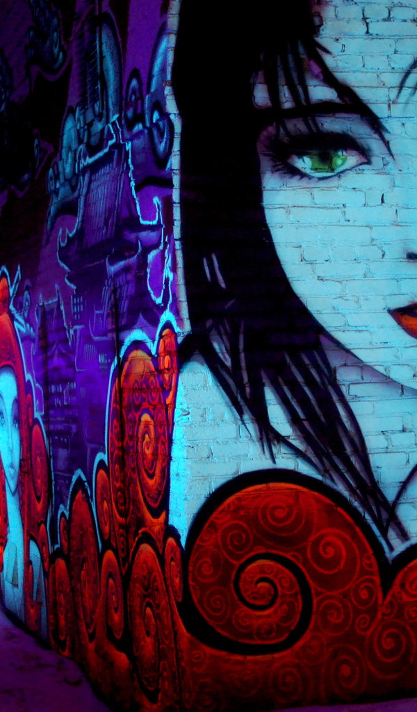 Graffiti, green-eyed girl