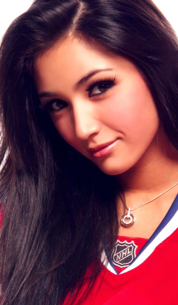 Женщина хоккеист