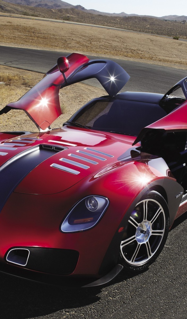 Красный автомобиль Devon GTX на повороте