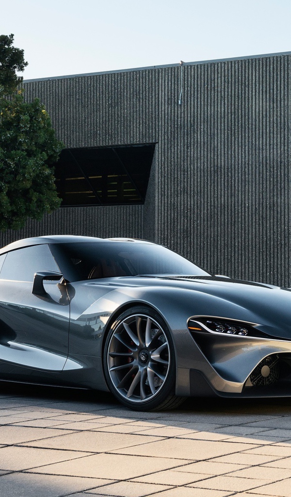 Автомобиль Scion на фоне здания