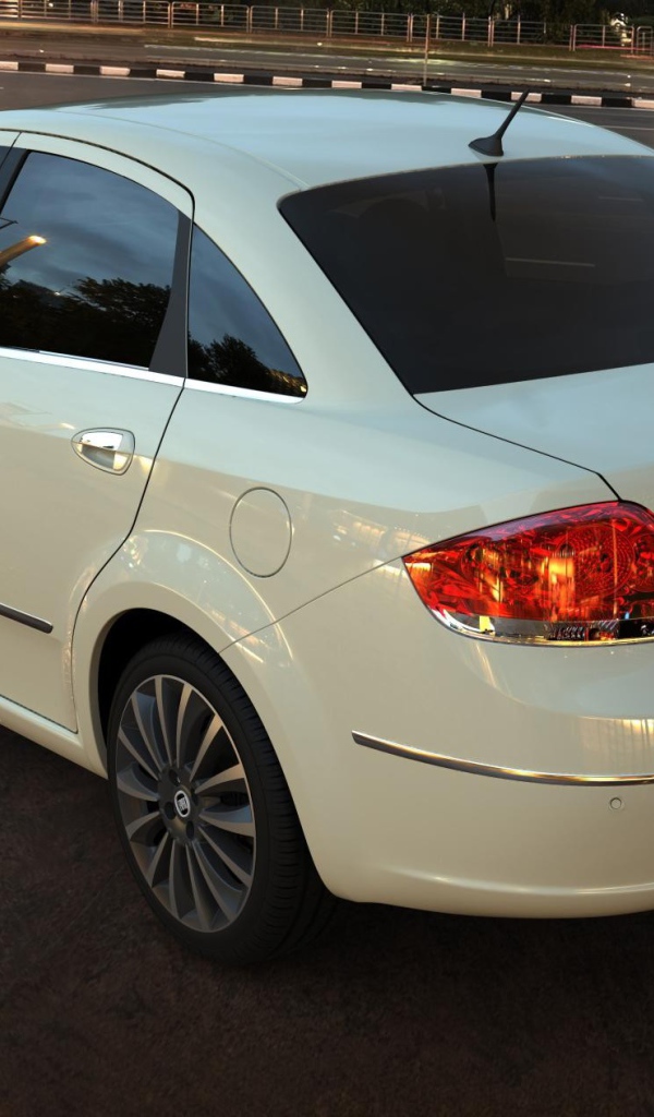 Вид сзади на белый Фиат у дороги