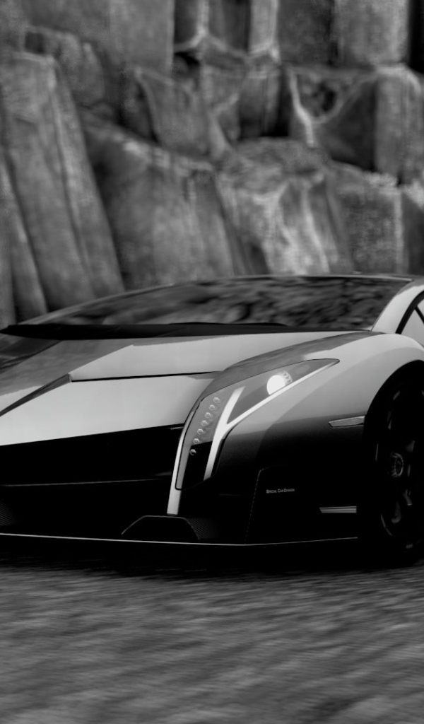 Черный Ламборгини у каменной скалы