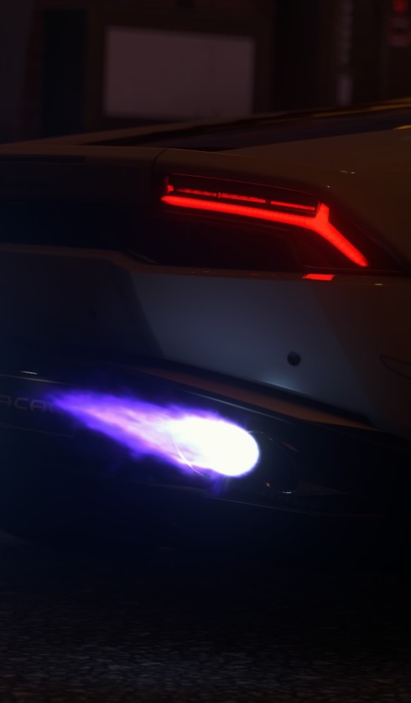 Голубые огоньки выхлопа Ламборгини