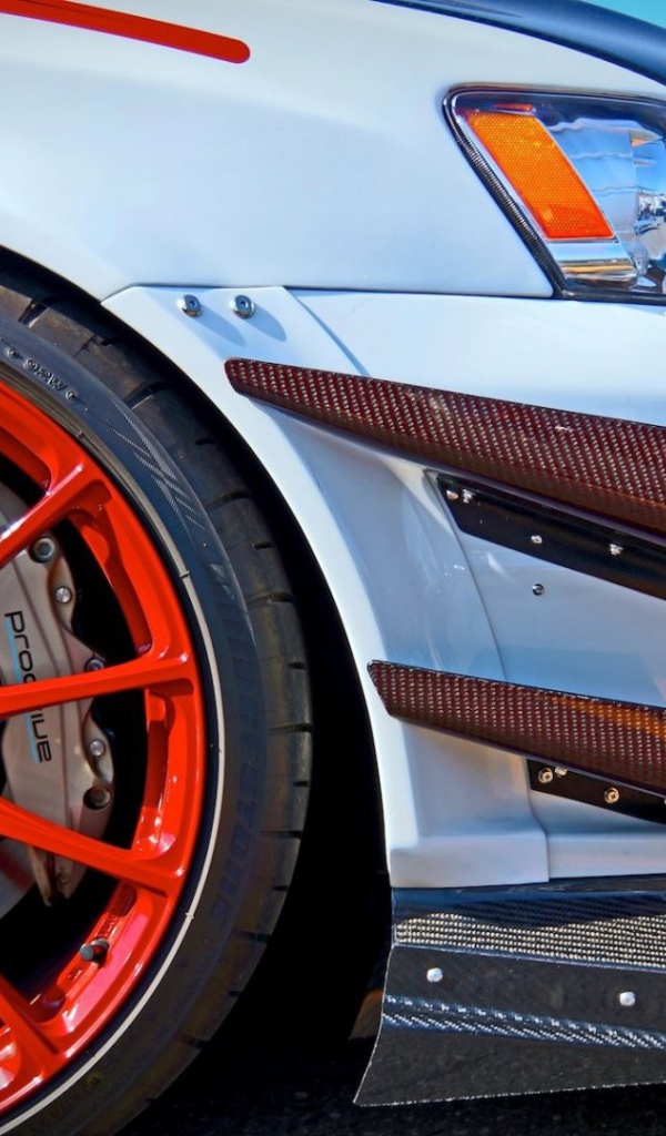 Оранжевый диск автомобиля Mitsubishi Lancer Evo X