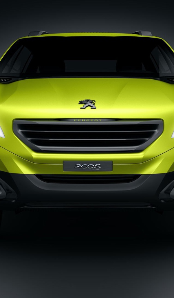 Желтый Peugeot 2008 на сером фоне