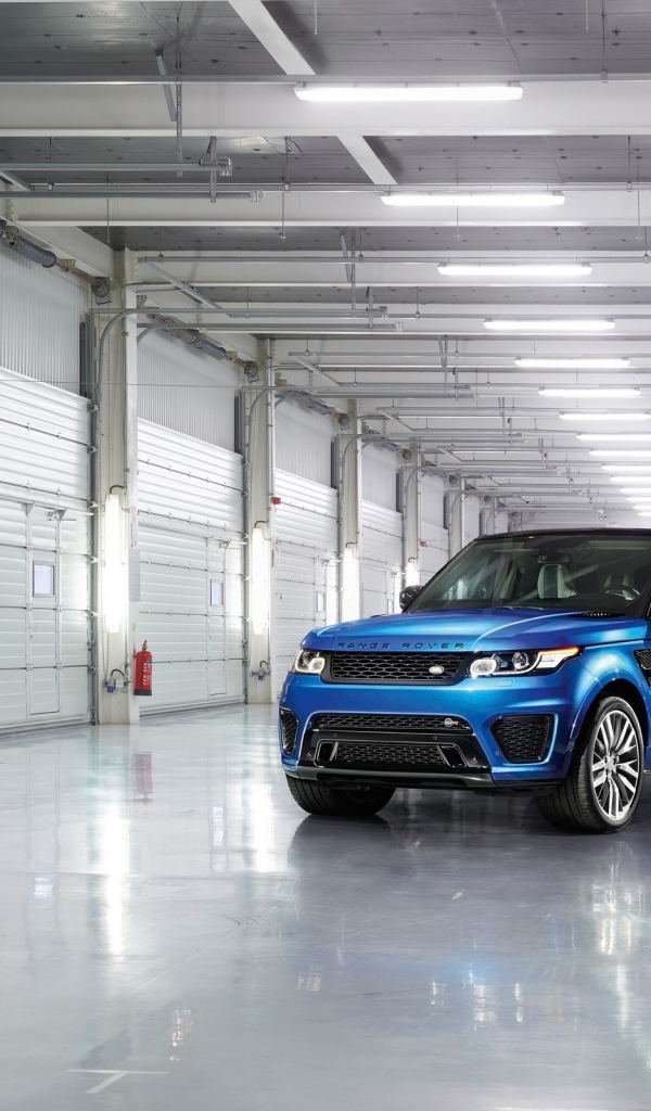 Blue Range Rover in the garage