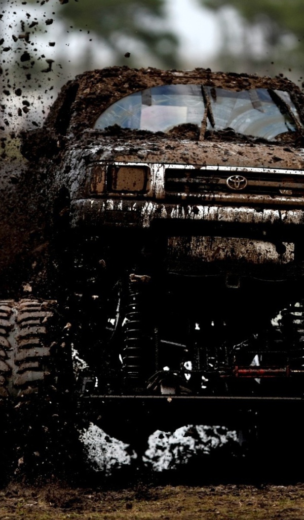 Toyota SUV covered in mud