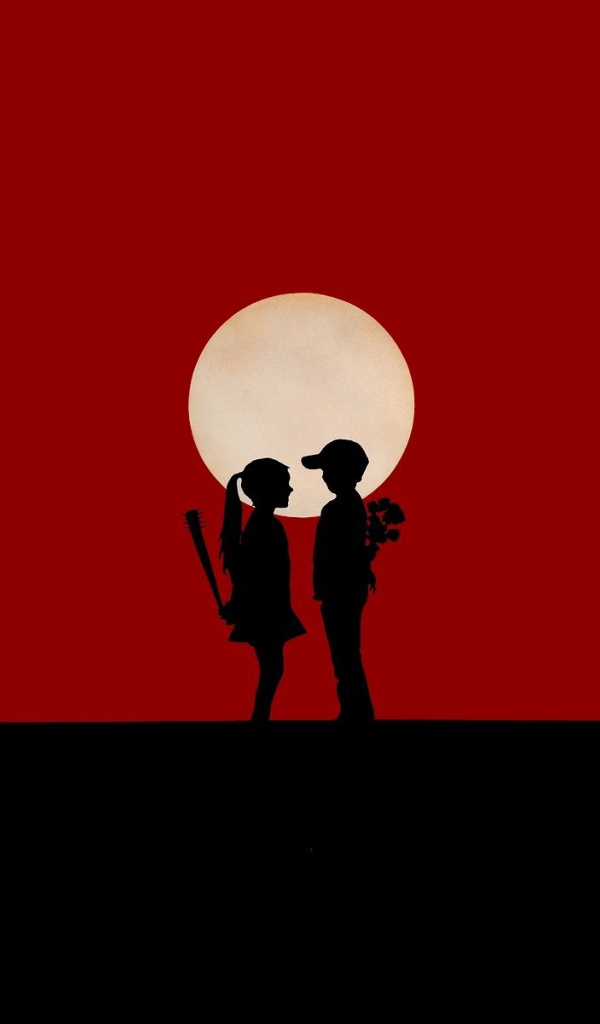 Мальчик и девочка на красном фоне