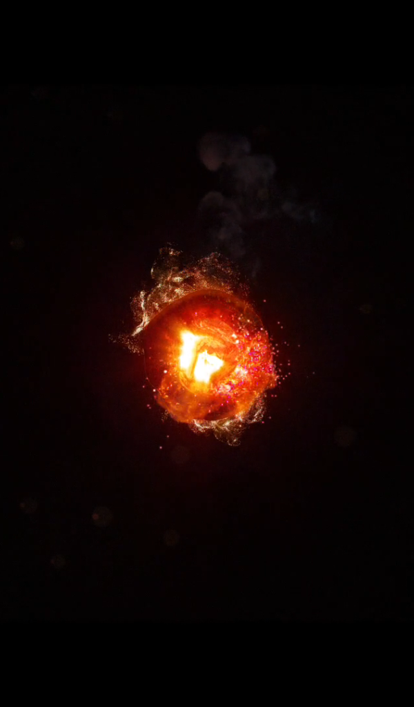 Горящий уголек, черный фон