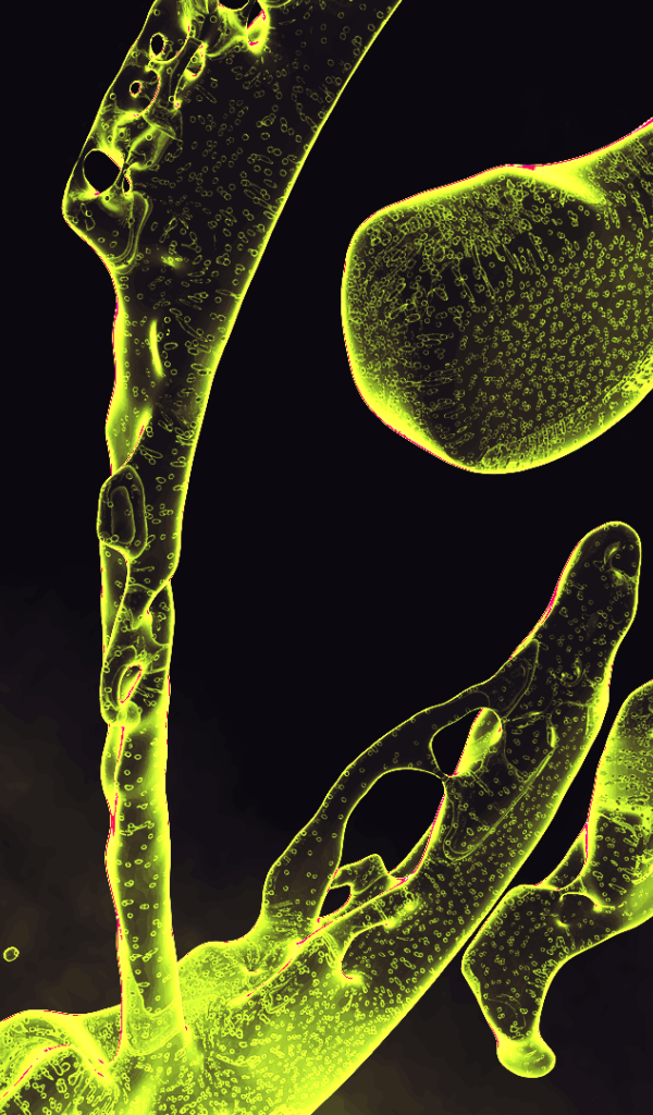 Капли зеленой жидкости на черном фоне