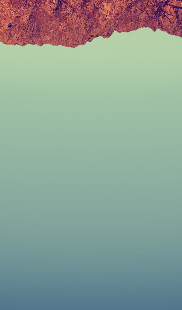 Красный камень на сером фоне