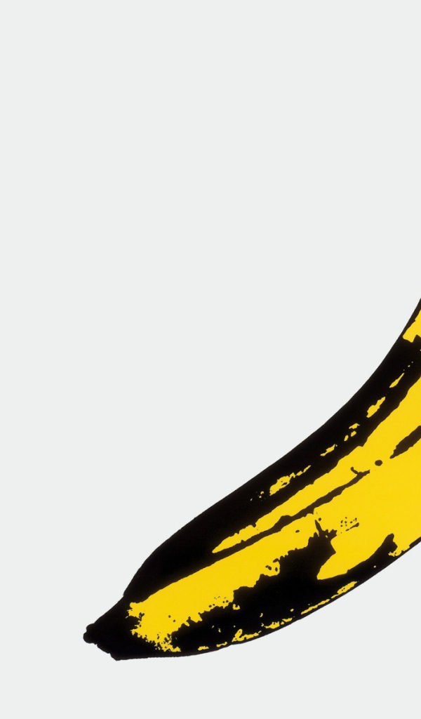 Спелый банан на белом фоне