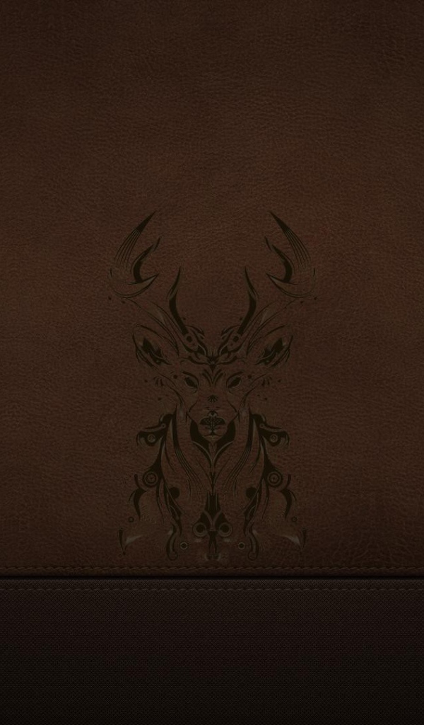 Силуэт оленя на коричневой коже