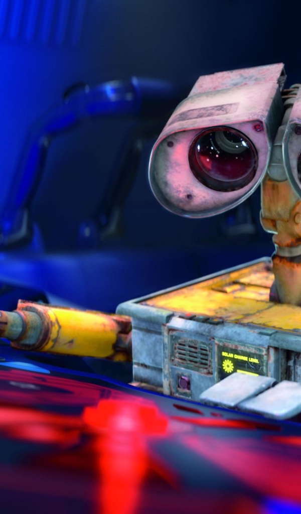 Робот WALL·E за пультом управления