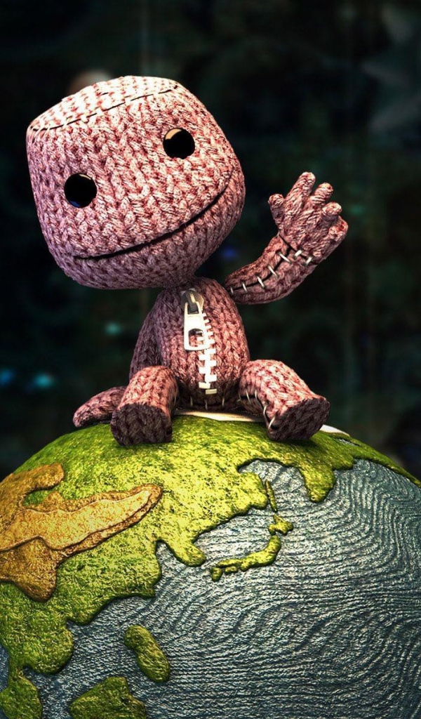 Вязаный человечек на глобусе