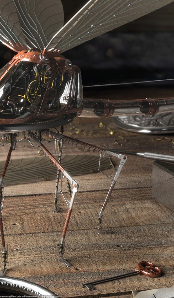 Механическая стрекоза в мастерской