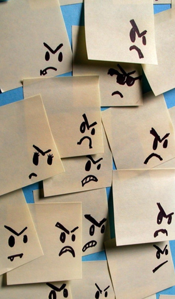 Испуганный стикер в окружении злых стикеров