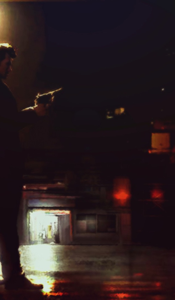 Мужчина с пистолетом на ночной улице