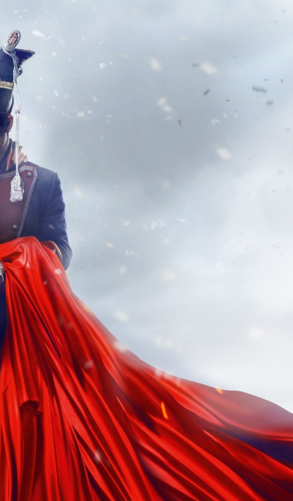 Улан держит на руках девушку в красном платье