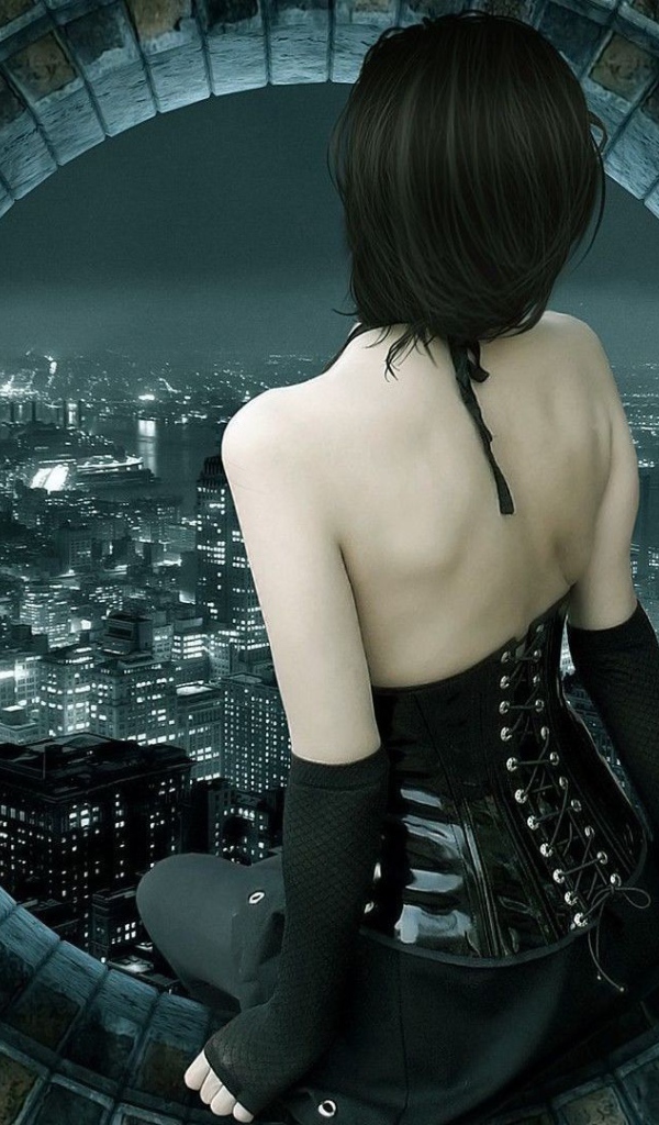 Девушка сидит на круглом окне