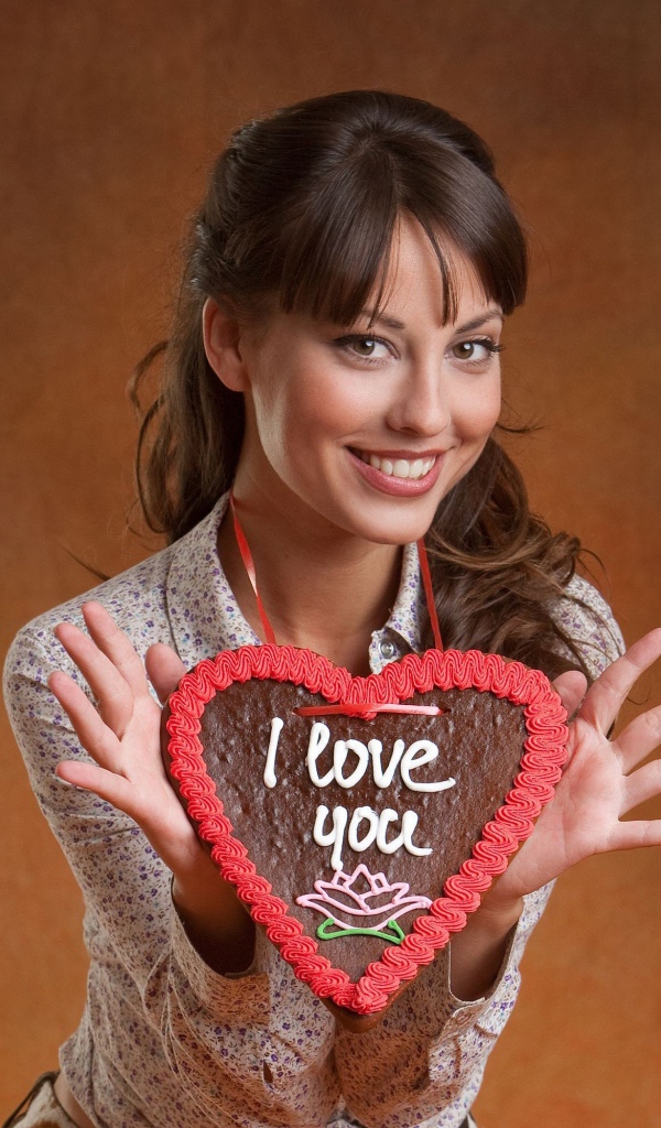 Лорена Гарсия держит в руках сердце