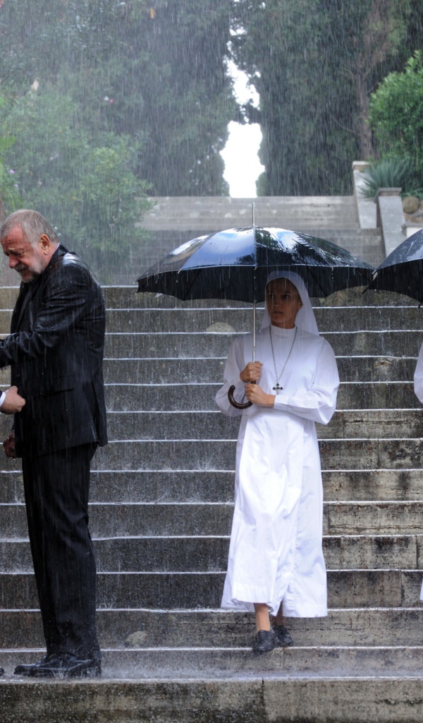 Монахи под дождем