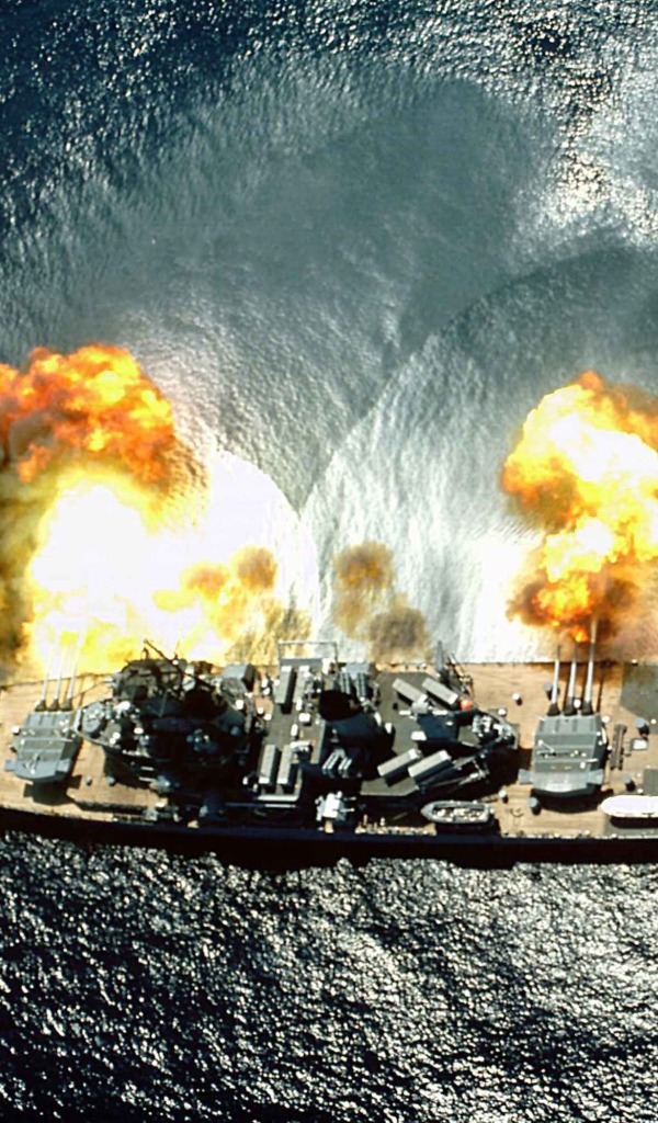 Военный корабль стреляет в море