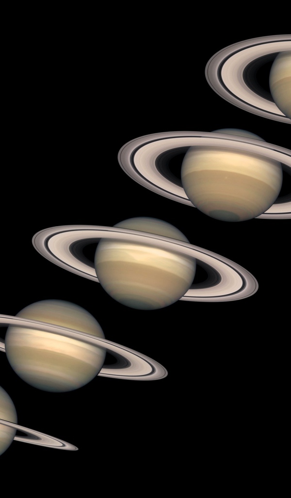 Несколько одинаковых планет на черном фоне