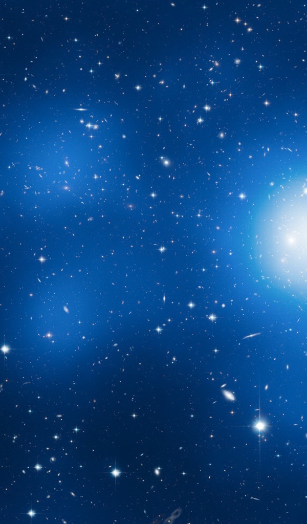 Звезды и галактики в голубом космосе