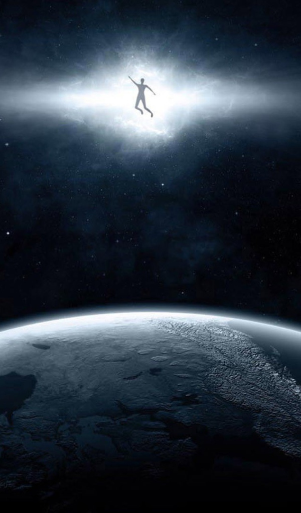 Человек в луче над планетой