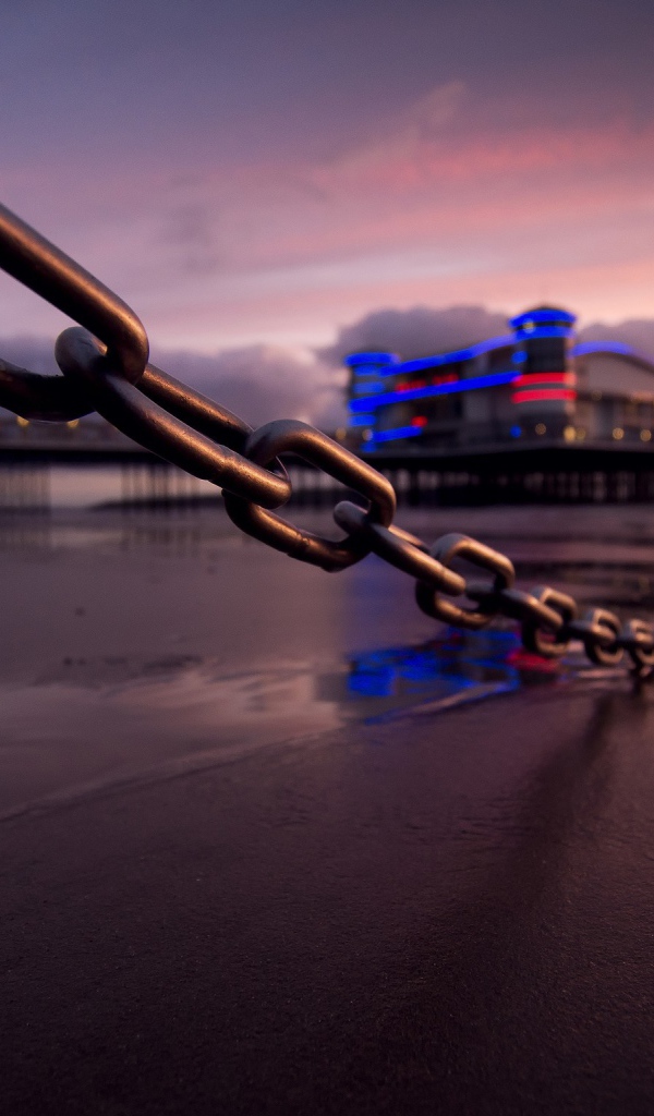 Цепь ограждения на пляже, Англия