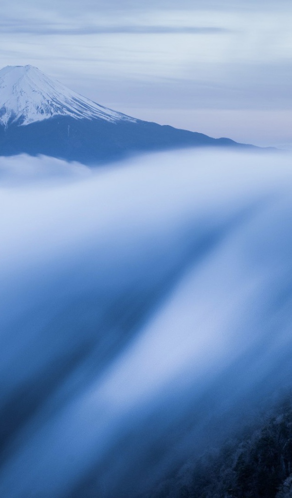The mist flows down the mountainside, Japan