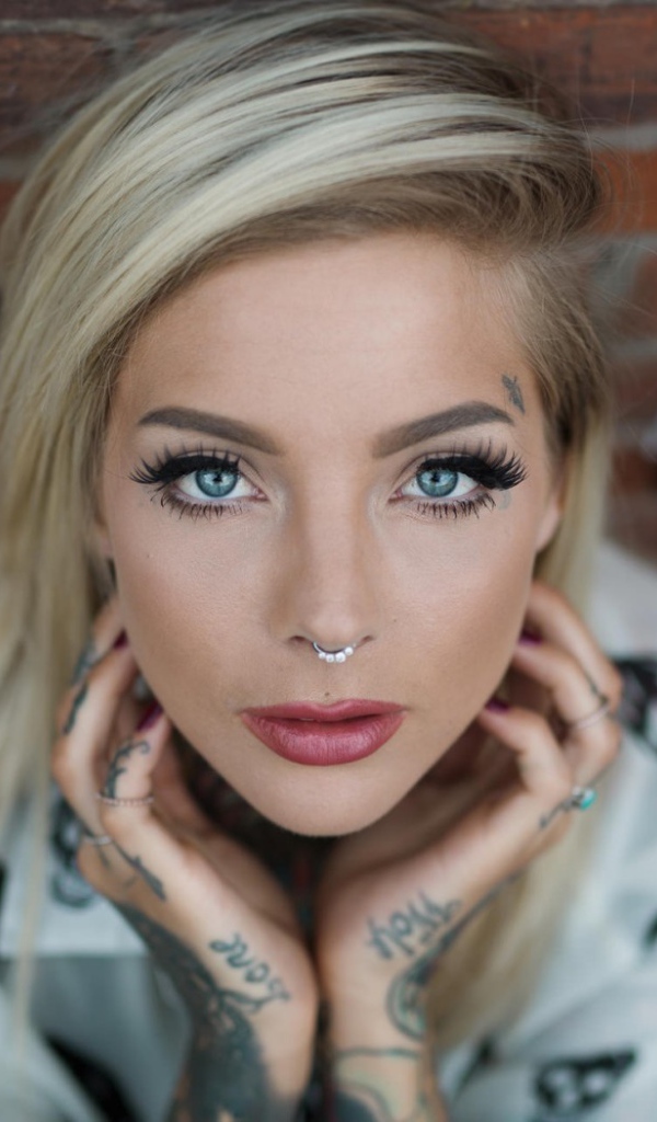 Piercing nose ring at the blonde