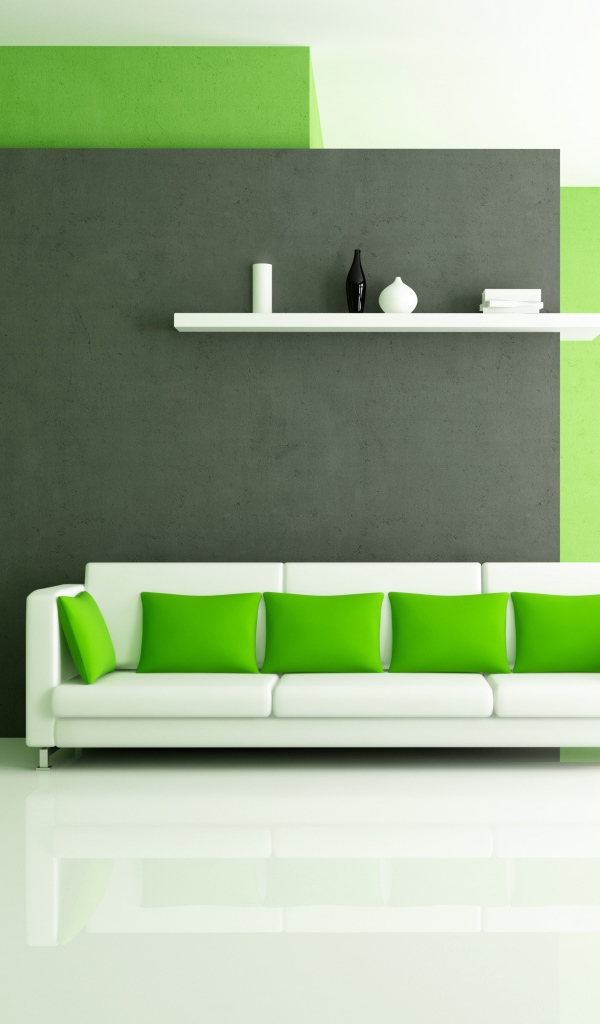 Белый диван с зелеными подушками