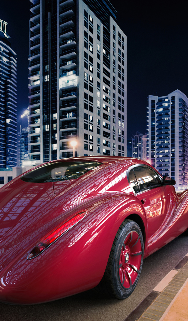 Необычный красный автомобиль Eadon Green Black Cuillin на фоне города 