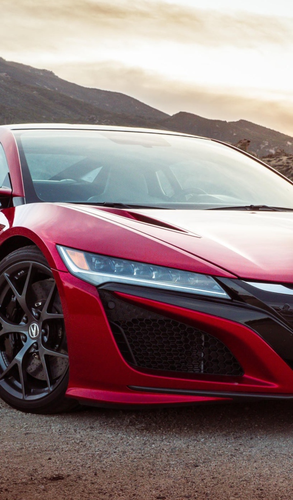 Красный автомобиль Acura NSX, 2017 на фоне гор 