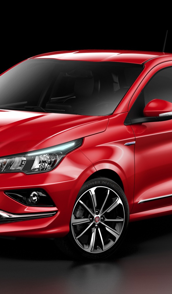 Красный автомобиль  Fiat Cronos, 2018 на черном фоне