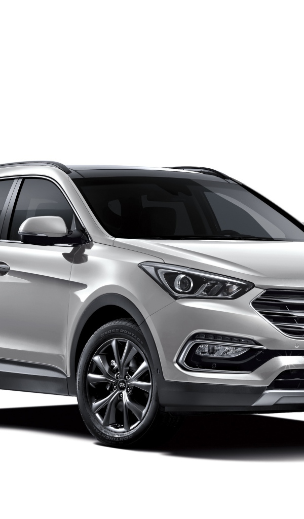Серебристый автомобиль Hyundai Santa Fe  на белом фоне