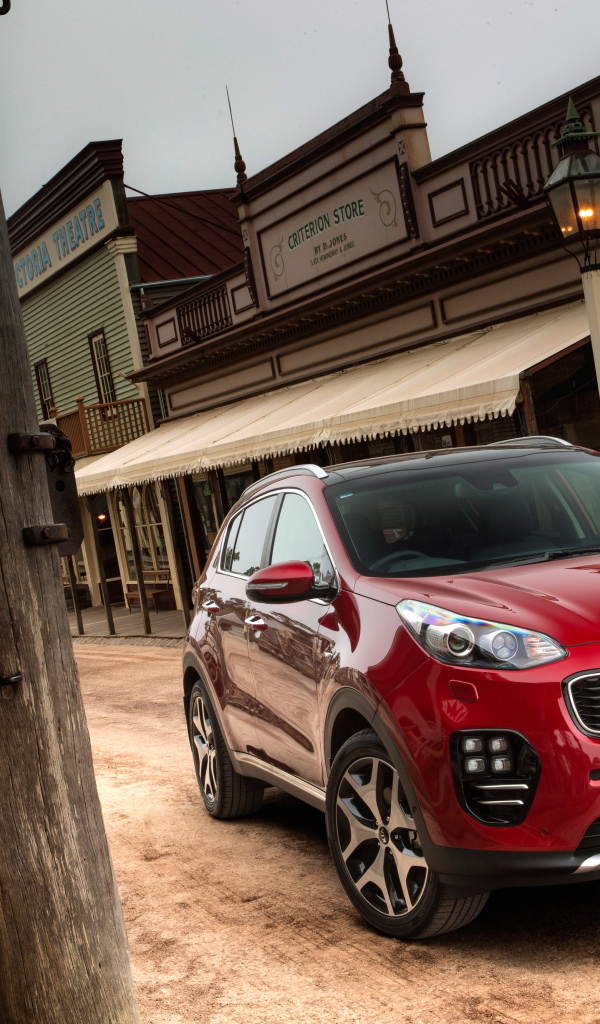 Красный внедорожник  Kia Sportage