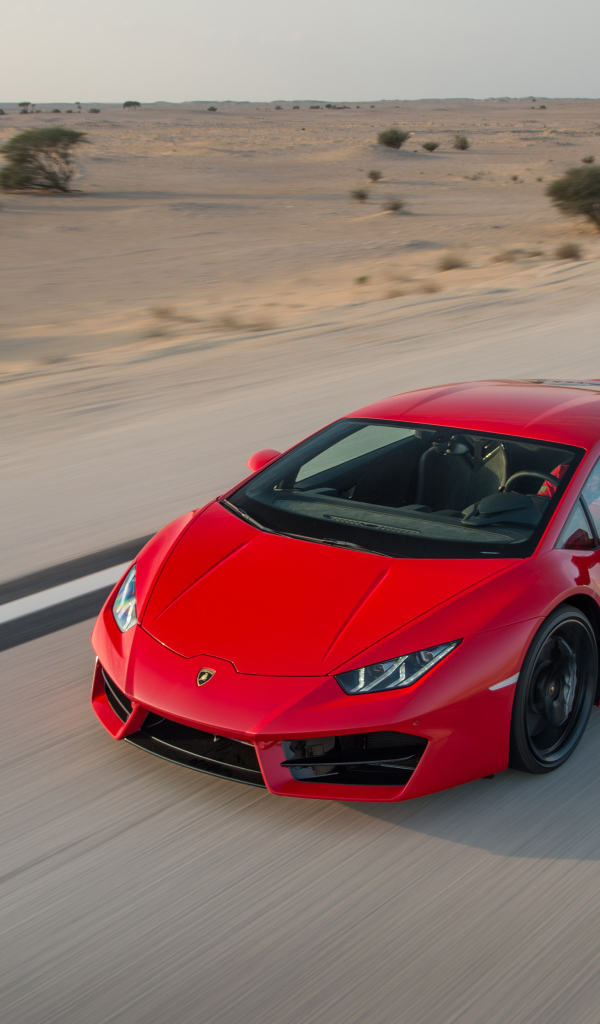 Красный спортивный автомобиль Lamborghini Huracan, LP 580-2 на трассе
