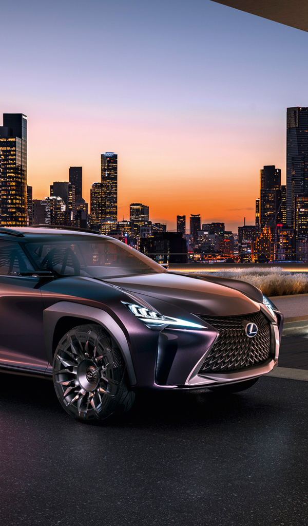 Стильный кроссовер Lexus UX на фоне ночного города